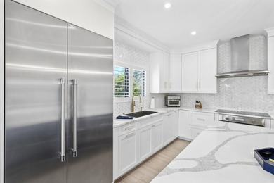 Welcome to the epitome of waterfront living in Ocean Ridge, just - photo 19