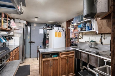 This turnkey opportunity features a premier city establishment - photo 12