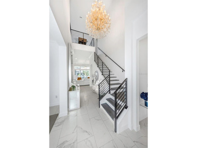 1016 Signet Loop is a 6-bedroom, 4.5-bath waterfront estate in - photo 10