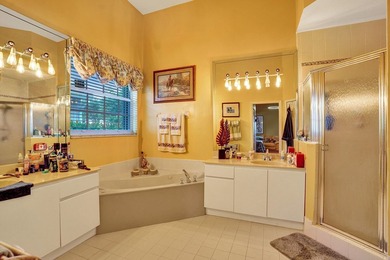 Nestled on a tranquil canal in the gated community of Spring - photo 11