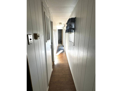This charming three-bedroom, two-bathroom home features not one - photo 12