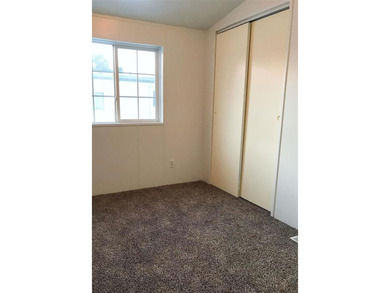 Rare opportunity under $75,000! This updated 3-bedroom, 2-bath - photo 13