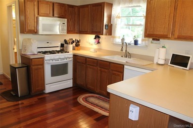 This fully renovated, 4-bedroom, 3-bathroom Colonial merges - photo 23