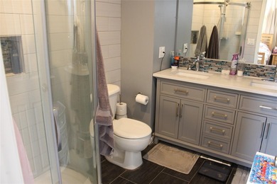 This fully renovated, 4-bedroom, 3-bathroom Colonial merges - photo 27