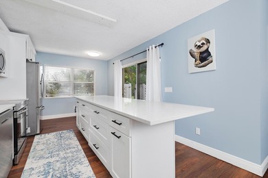 Updated 2 bedroom, 2.5-bathroom DiVosta built townhouse in the - photo 8
