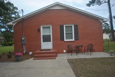 Welcome home to this charming 3-bedroom, 1-bath home in the - photo 3