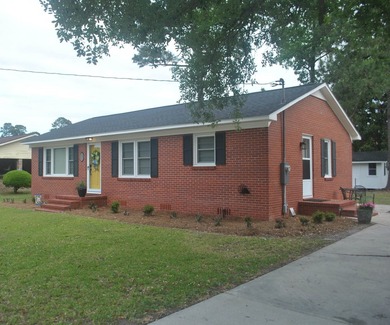 Welcome home to this charming 3-bedroom, 1-bath home in the - photo 4
