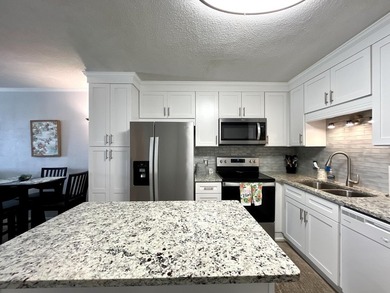 Wake up to ocean views in this beautifully updated 2BR/2BA condo - photo 6