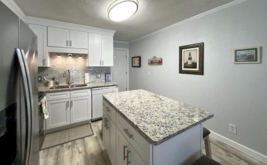 Wake up to ocean views in this beautifully updated 2BR/2BA condo - photo 9