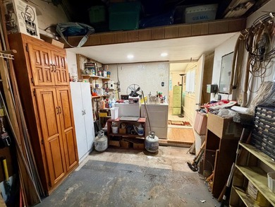 Opportunity awaits in this solid CBS construction home in the - photo 13