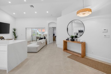 Exquisitely remodeled 3-bedroom, 2-bath corner villa in the - photo 5