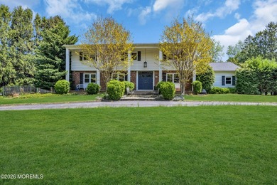 Stately center hall colonial set on an oversized 1.3-acre lot in - photo 2
