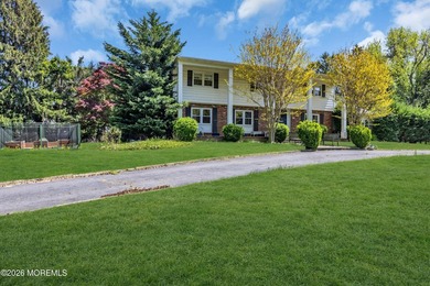 Stately center hall colonial set on an oversized 1.3-acre lot in - photo 3
