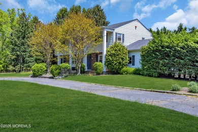 Stately center hall colonial set on an oversized 1.3-acre lot in - photo 4