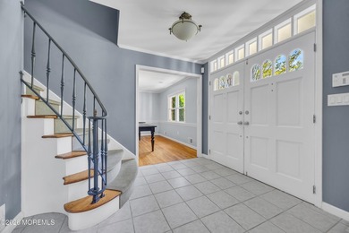 Stately center hall colonial set on an oversized 1.3-acre lot in - photo 5