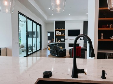 Welcome to 1702 Ludlow Road, a custom home situated on an - photo 40