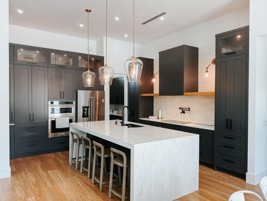 Welcome to 1702 Ludlow Road, a custom home situated on an - photo 48