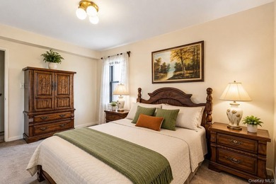 Welcome to this bright and inviting 2-bedroom, 1-bath co-op in - photo 4