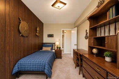 Welcome to this bright and inviting 2-bedroom, 1-bath co-op in - photo 6
