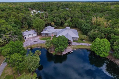 Welcome to this expansive estate set on 5 acres offering an - photo 1