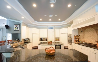 Welcome to this expansive estate set on 5 acres offering an - photo 8