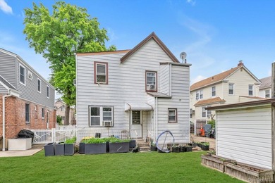 This detached two-family features a 3-bedroom/1-bathroom unit - photo 9