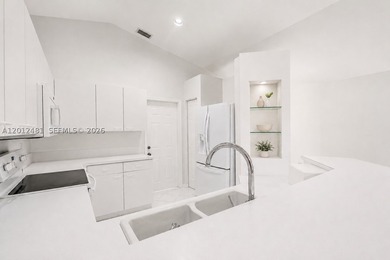 Beautifully maintained 3-bedroom, 2-bathroom home located in an - photo 7