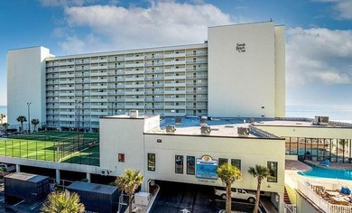 Oceanfront living on sought-after Shore Drive! This fully - photo 1