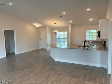 MOVE IN READY! Nestled in the NE area of Cape Coral, this - photo 4