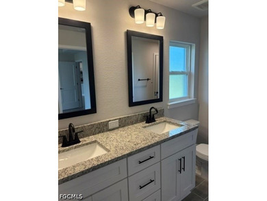 MOVE IN READY! Nestled in the NE area of Cape Coral, this - photo 7
