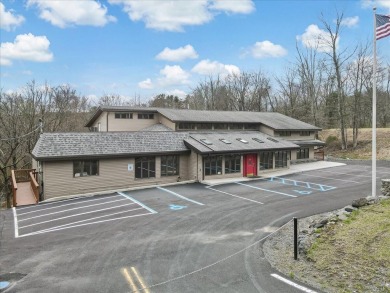 With Parking lot expanded, repaved, and restriped, retaining