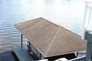 LAKEFRONT LIVING AT ITS BEST! THIS 3 BED, 1 BATH PROPERTY OFFERS - photo 6