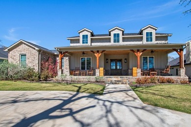 Stunning 4-bedroom, 3-bath modern farmhouse in the gated