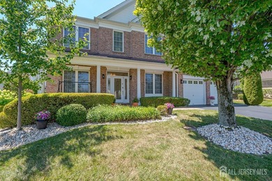 Welcome home to this stunning brick-front Tradition Model where - photo 1