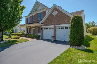 Welcome home to this stunning brick-front Tradition Model where - photo 3