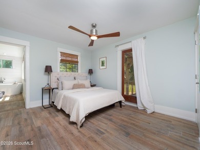 Embrace casual beach town living in this beautifully renovated - photo 14