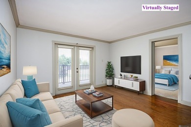 Experience downtown living at its finest with this exceptional 2 - photo 1