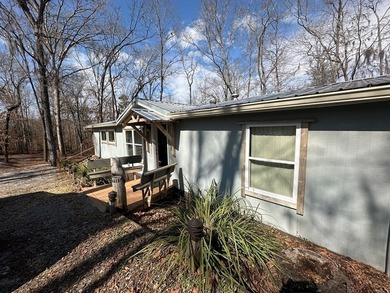 REDUCED!!! Experience ultimate lakeside living on 952 feet of - photo 3