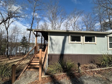 REDUCED!!! Experience ultimate lakeside living on 952 feet of - photo 4