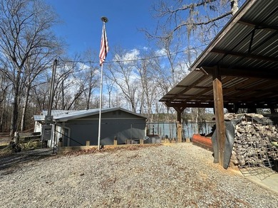 REDUCED!!! Experience ultimate lakeside living on 952 feet of - photo 6