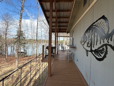 REDUCED!!! Experience ultimate lakeside living on 952 feet of - photo 8