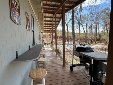 REDUCED!!! Experience ultimate lakeside living on 952 feet of - photo 9