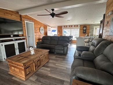 REDUCED!!! Experience ultimate lakeside living on 952 feet of - photo 10