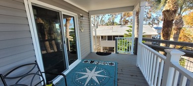 Welcome to effortless waterfront living in the peaceful, golf - photo 11