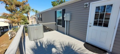 Welcome to effortless waterfront living in the peaceful, golf - photo 17