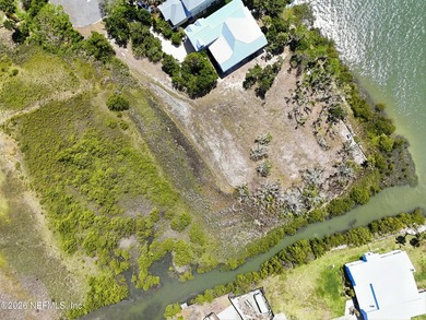This peninsula property is just under an acre and sits at the - photo 18