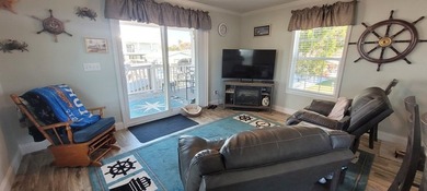 Welcome to effortless waterfront living in the peaceful, golf - photo 19