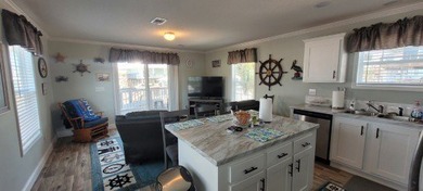Welcome to effortless waterfront living in the peaceful, golf - photo 21