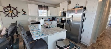 Welcome to effortless waterfront living in the peaceful, golf - photo 22