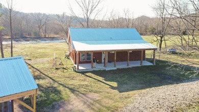 Situated on the banks of the beautiful, clear Caddo River, this - photo 1